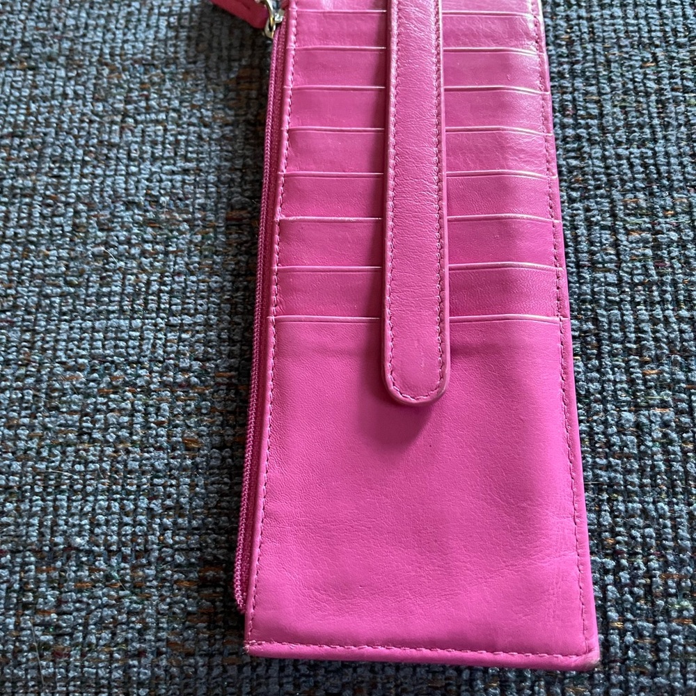 Pink leather credit card wallet.